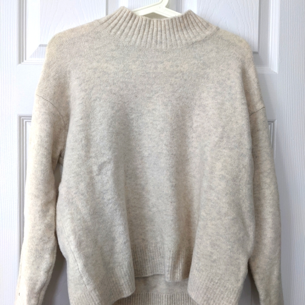 Cream/ ivory/ marled white Uniqlo wool blend sweater